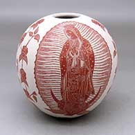 A red on white jar decorated with a sgraffito Virgin of Guadalupe, rose, vine and geometric design
 by Hector Javier Martinez of Mata Ortiz and Casas Grandes