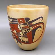 A tall polychrome bowl decorated with a two-panel bird element and geometric design
 by Gloria Kahe of Hopi