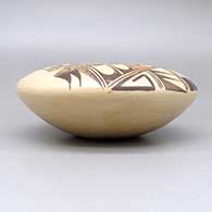 Polychrome jar with a geometric design, click or tap to see a larger version