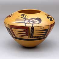 A polychrome bowl decorated with a four-panel bird, bird element and geometric design
 by Garrett Maho of Hopi