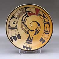 A polychrome serving bowl decorated inside with a bird-hanging-from-sky-band and geometric design
 by Garnet Pavatea of Hopi