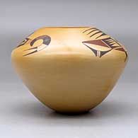 A polychrome jar decorated with a two-panel stylized parrot and geometric design, above the shoulder, click or tap to see a larger version