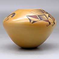 A polychrome jar decorated with a two-panel stylized parrot and geometric design, above the shoulder, click or tap to see a larger version
