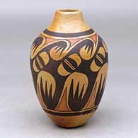 A polychrome vase decorated with a seven-panel stylized migration pattern and geometric design
 by Miriam Nampeyo of Hopi