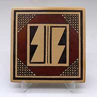 A polychrome tile decorated with a geometric design
 by Stetson Setalla of Hopi