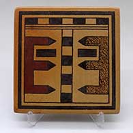 A polychrome tile decorated with a geometric design
 by Stetson Setalla of Hopi