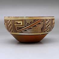 A polychrome bowl decorated on the inside with a black on white katsina design and on the outside with a four panel geometric design and fire clouds, click or tap to see a larger version
