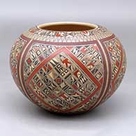 A polychrome bowl decorated with a four panel small shard and geometric design
 by Rondina Huma of Hopi