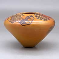 A polychrome jar decorated above the high shoulder with a bird element, crosshatch, checkerboard and geometric design, plus fire clouds, click or tap to see a larger version