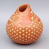 Red jar with organic opening and sgraffito geometric design
 by Carol Vigil of Jemez