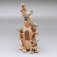 A polychrome canine storyteller figure with four puppies
 by Bonnie Fragua of Jemez