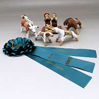 A five-piece Jemez nativity set, Best of Show ribbon from 2024 New Mexico State Fair
 by Clifford Kim Fragua of Jemez