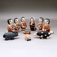 A ten-piece Nativity set
 by Angel Bailon of Santo Domingo