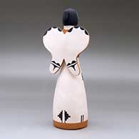 A standing polychrome Singing Angel with a nativity scene inside a cutout in her skirt, click or tap to see a larger version
