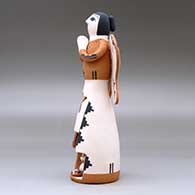 A standing polychrome Singing Angel with a nativity scene inside a cutout in her skirt, click or tap to see a larger version