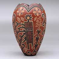 A polychrome vase with a scalloped rim and decorated with a lightly-carved and painted four-panel kachina, flower and geometric design, click or tap to see a larger version