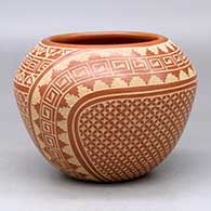 Click for a larger view A red jar decorated with a sgraffito snowflake, scroll, kiva step and geometric design
by Wilma Baca Tosa of Jemez
