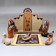 A six-piece Nativity set with a carpet, click or tap to see a larger version