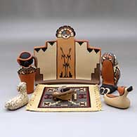 A six-piece Nativity set with a carpet, click or tap to see a larger version