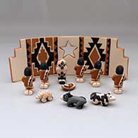 An eleven piece Jemez-style nativity, click or tap to see a larger version