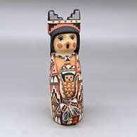 A polychrome Corn Maiden figure wearing a tablito and holding a child and butterfly
 by Linda Lucero Fragua of Jemez