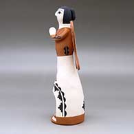 A polychrome Singing Angel figure with a nativity in her skirt, click or tap to see a larger version