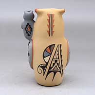 An owl storyteller figure with two chicks, click or tap to see a larger version