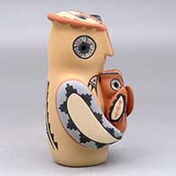 An owl storyteller figure with two chicks, click or tap to see a larger version