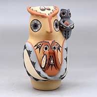 An owl storyteller figure with two chicks, click or tap to see a larger version