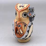 An owl storyteller figure with two chicks
 by Linda Lucero Fragua of Jemez