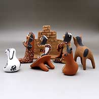 An eight piece Jemez style nativity set, click or tap to see a larger version