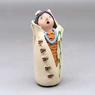 A polychrome Corn Maiden figure
 by Mary Lucero of Jemez