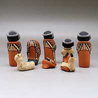 An eight piece Jemez style nativity set, click or tap to see a larger version