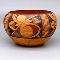 A polychrome mixed-clay bowl decorated around the body with a four-panel rainbird and geometric design
 by Calvin Analla Jr of Laguna