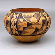 A black-on-mixed-clay jar decorated with a four-panel fine line and geometric design
 by Calvin Analla Jr of Laguna