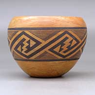 A polychrome mixed clay bowl decorated with a band of fineline and geometric design around the body, click or tap to see a larger version