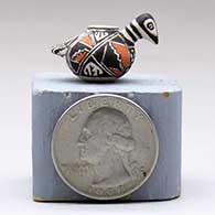 A miniature polychrome bird effigy pot decorated with a geometric design, click or tap to see a larger version