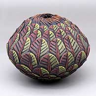 A polychrome sgraffito and painted flower bud jar
 by Richard Zane Smith of Wyandot