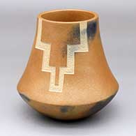 A golden micaceous low-shoulder jar decorated with a sgraffito kiva step geometric design
 by Robert Vigil of Nambe