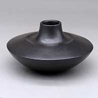 A double-shouldered black micaceous jar
 by Robert Vigil of Nambe