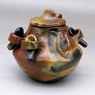 A lidded brown bean pot with fire clouds, ear-of-corn appliques, ladle and 4 spoons
 by Andrea Manygoats of Dineh