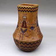 A polychrome jar with a square neck and decorated with a sgraffito and painted yeibichai, shield and geometric design
 by Nancy Yazzie of Dineh