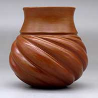 A brown melon jar with fire clouds and nine repousse ribs, click or tap to see a larger version