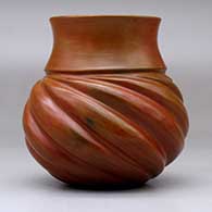 A brown melon jar with fire clouds and nine repousse ribs, click or tap to see a larger version