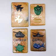 Four polychrome tiles with Dine words and examples
 by Elizabeth Manygoats of Dineh