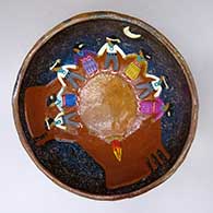 A polychrome bowl decorated inside with Navajo countryside and Dine dancers around a campfire
 by Elizabeth Manygoats of Dineh