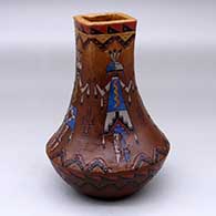 A low shouldered polychrome jar with a square opening and decorated with a sgraffito and painted Yeibichai, cloud pattern and geometric design
 by Nancy Yazzie of Dineh
