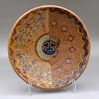 Click for a larger view A wide polychrome bowl decorated inside with a sgraffito and painted Yeibichai, sun, feather, star and geometric design, and decorated outside with bands of Navajo carpet design
by Nancy Yazzie of Dineh