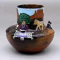 A polychrome Navajo Lifestyle pot
 by Elizabeth Manygoats of Dineh