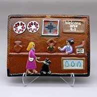 A polychrome tile decorated with a Dineh trading post design
 by Elizabeth Manygoats of Dineh